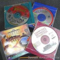 Box of computer game cd's whitetail hunting game, pin ball science, toy story, new ways things work,