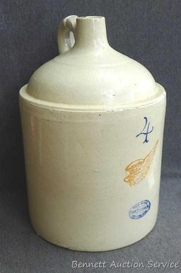 Redwing 4 gallon jug, Union Stoneware Co.; measures 11" x 17" tall. Chip noted on top edge of spout.