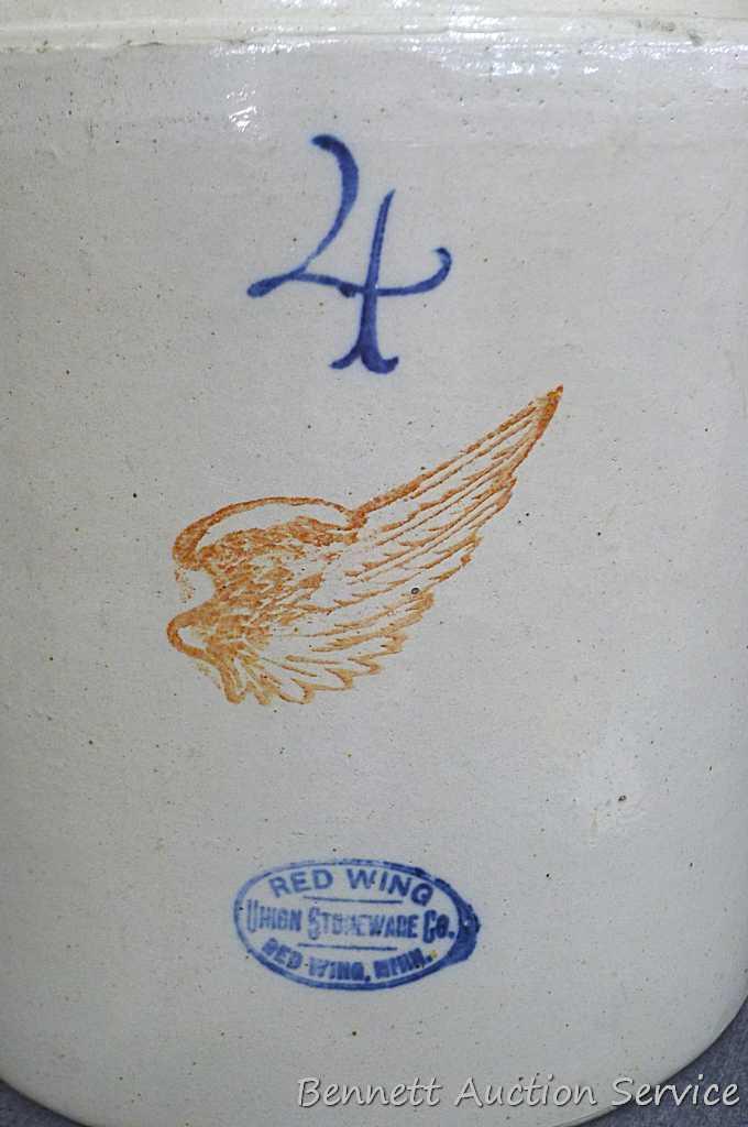 Redwing 4 gallon jug, Union Stoneware Co.; measures 11" x 17" tall. Chip noted on top edge of spout.