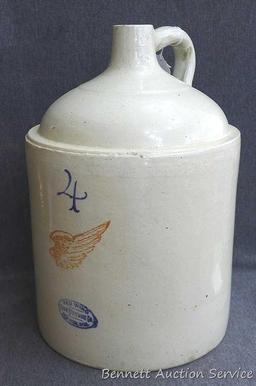 Redwing 4 gallon jug, Union Stoneware Co.; measures 11" x 17" tall. Chip noted on top edge of spout.