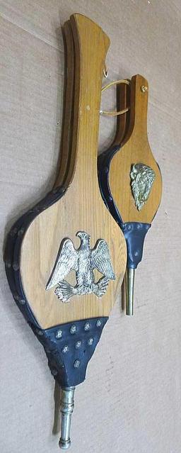 Two fireplace bellows up to 22" long. Small cracking noted on leather of larger ones, but both blow