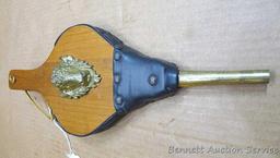 Two fireplace bellows up to 22" long. Small cracking noted on leather of larger ones, but both blow