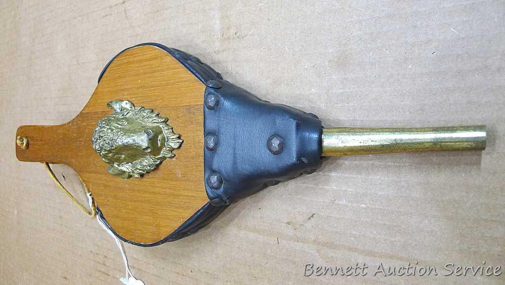 Two fireplace bellows up to 22" long. Small cracking noted on leather of larger ones, but both blow