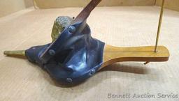Two fireplace bellows up to 22" long. Small cracking noted on leather of larger ones, but both blow
