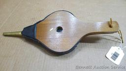 Two fireplace bellows up to 22" long. Small cracking noted on leather of larger ones, but both blow
