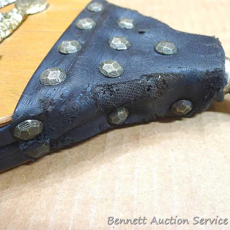 Two fireplace bellows up to 22" long. Small cracking noted on leather of larger ones, but both blow