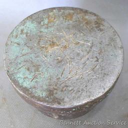 Small solid steel bench anvil is 2-1/2" tall and 3" diameter. Nice for delicate work.