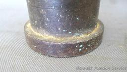 Small solid steel bench anvil is 2-1/2" tall and 3" diameter. Nice for delicate work.