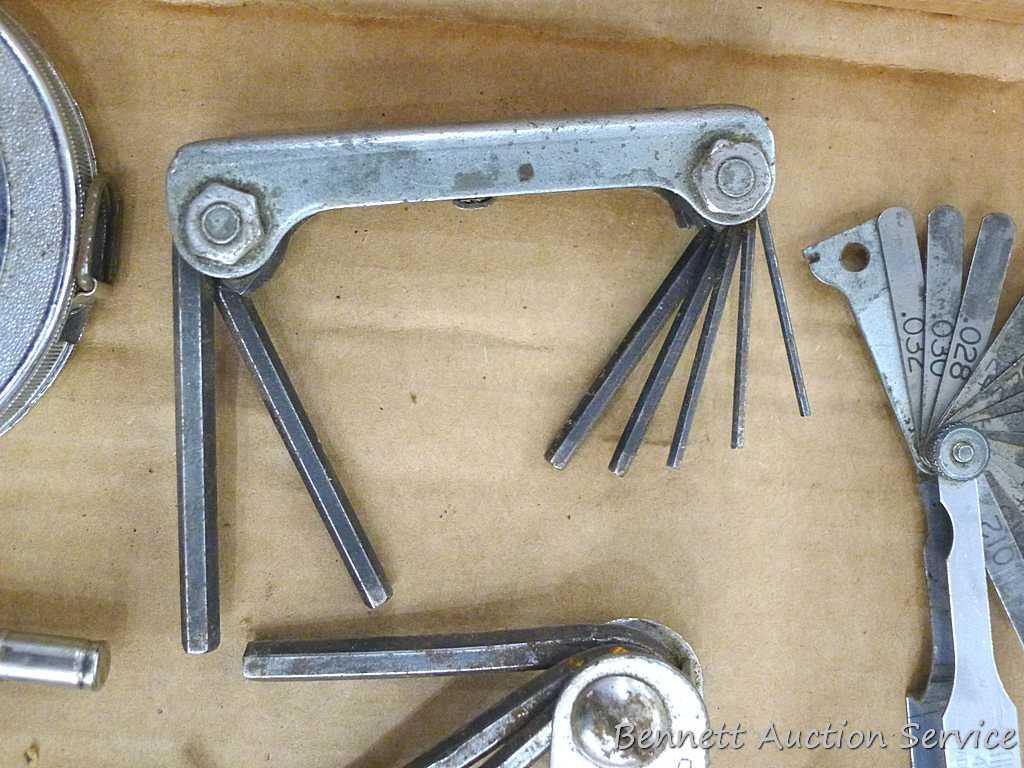 Craftsman and other feeler gauges, hex wrench sets, measuring tapes, plus a 3" miniature oil bottle.