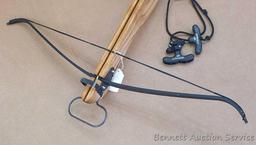 Powermaster crossbow has a nice hardwood stock and is about 3' long overall, 32" wide. Back sight