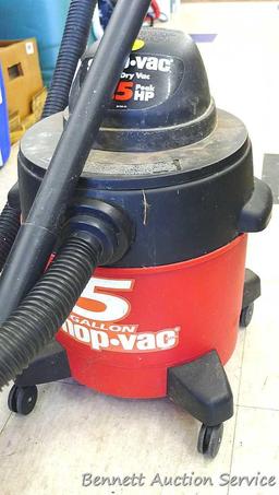 5 gallon 1.5 HP wet and dry shop vac. Shop vac has some sludge in bottom of canister, but has
