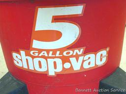 5 gallon 1.5 HP wet and dry shop vac. Shop vac has some sludge in bottom of canister, but has