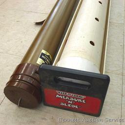 Two rod cases, one is telescoping, plus Measure-N-Slide fish measure trough. Telescoping rod case