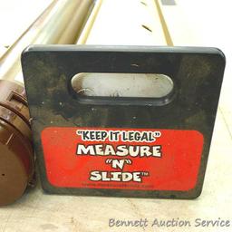 Two rod cases, one is telescoping, plus Measure-N-Slide fish measure trough. Telescoping rod case
