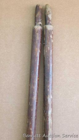 Pair of row boat oars which measure approx.. 83" x 5". Oars are worn but would restore or repurpose