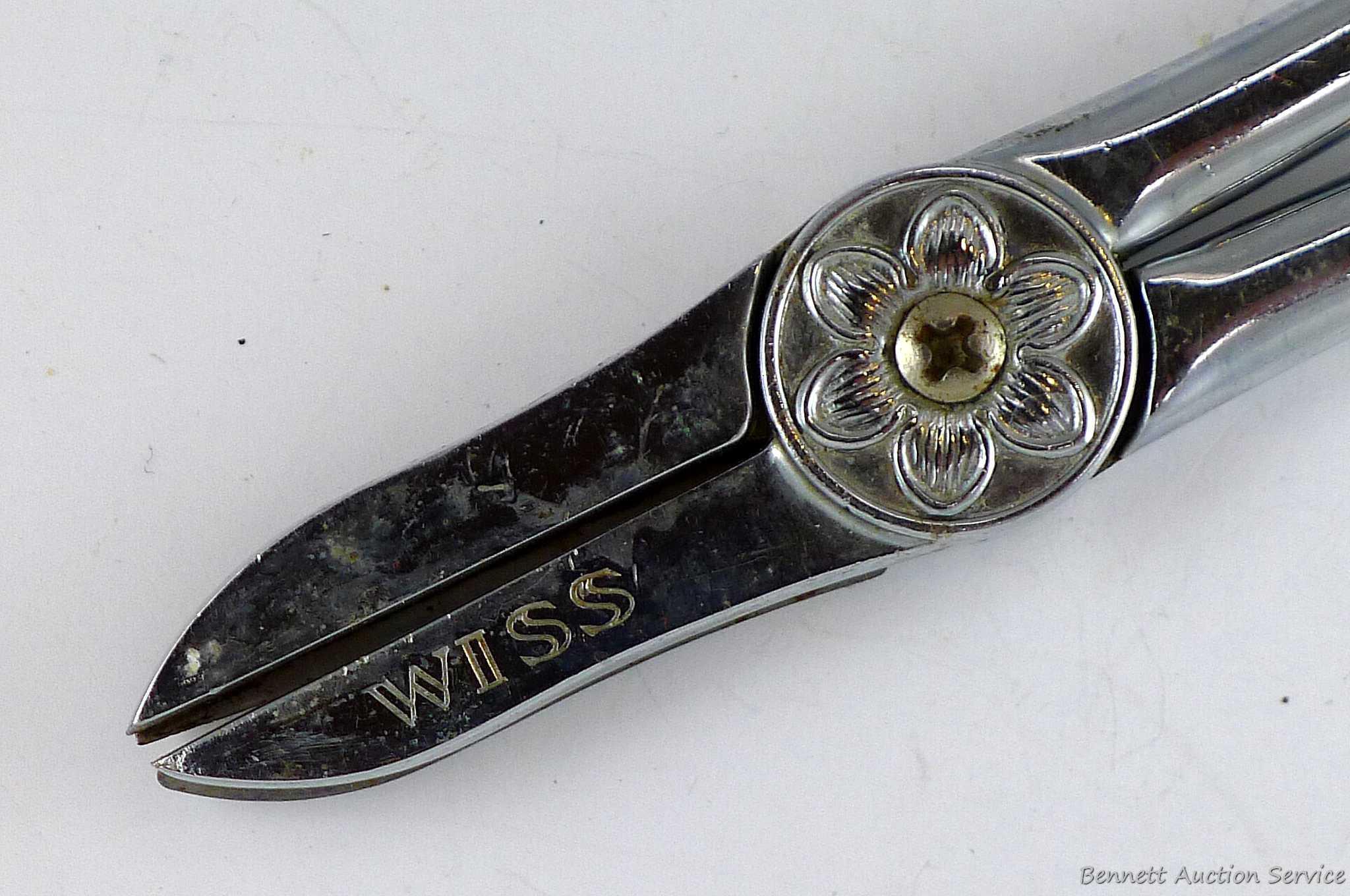 Antique Wiss flower shears measure 6-1/2" overall. Neat piece.