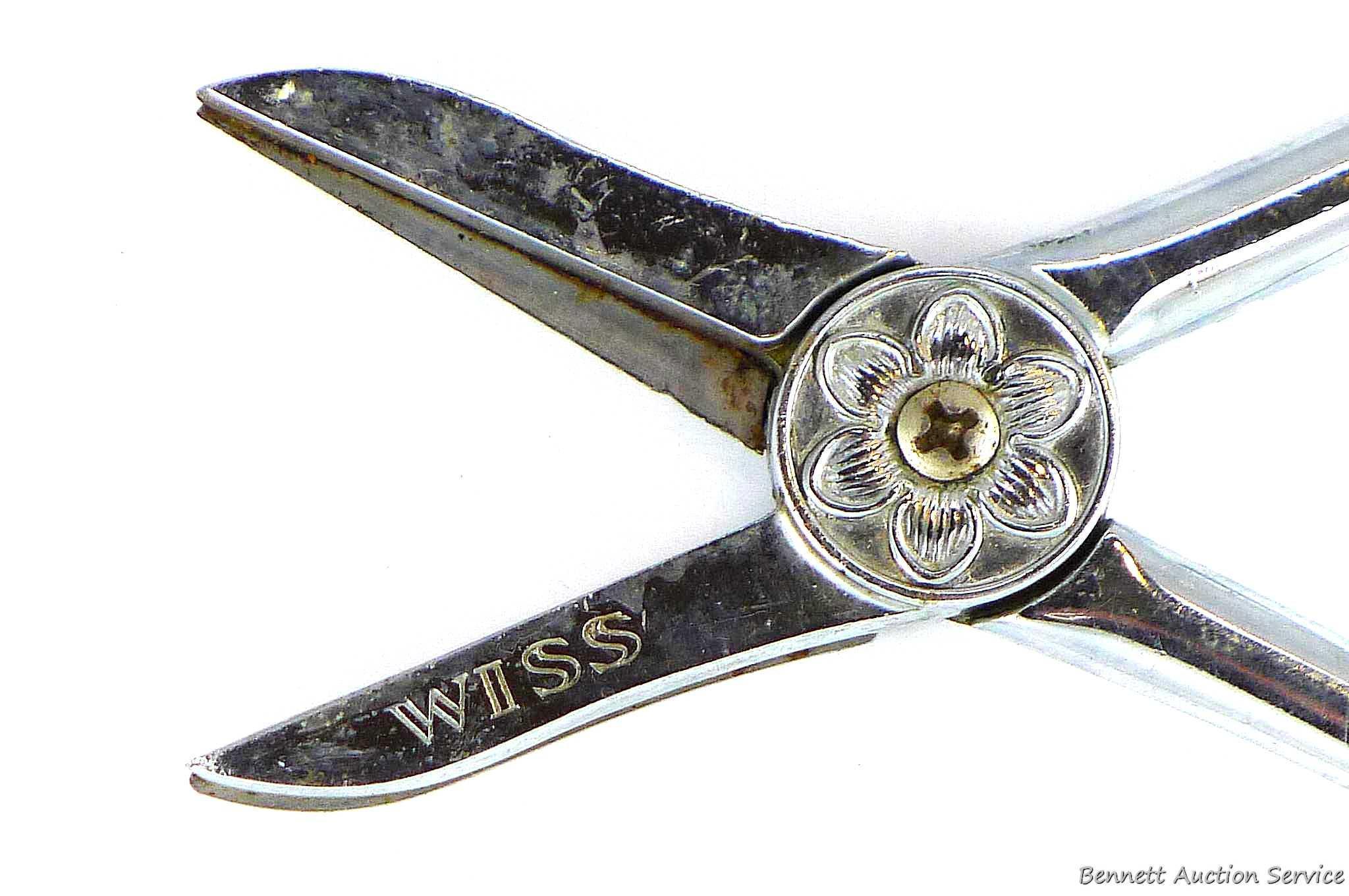 Antique Wiss flower shears measure 6-1/2" overall. Neat piece.