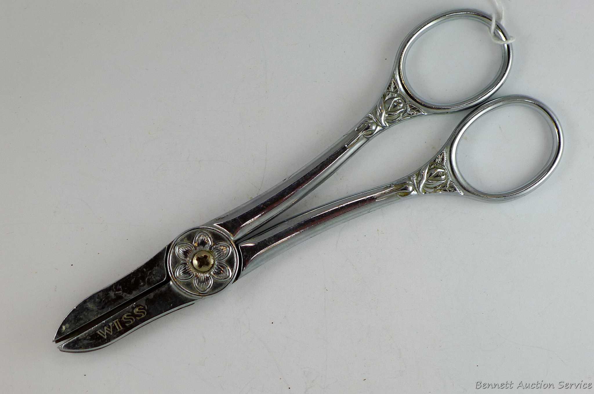 Antique Wiss flower shears measure 6-1/2" overall. Neat piece.