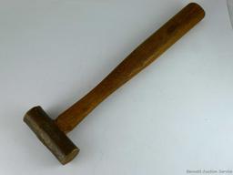 Cute little hammer with a brass head measures 7-3/4" overall. Brass head is nearly 3" wide.