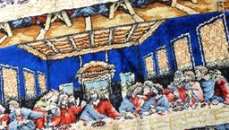 Two last supper wall tapestries. Both in good condition, largest measures 43'' x 19''