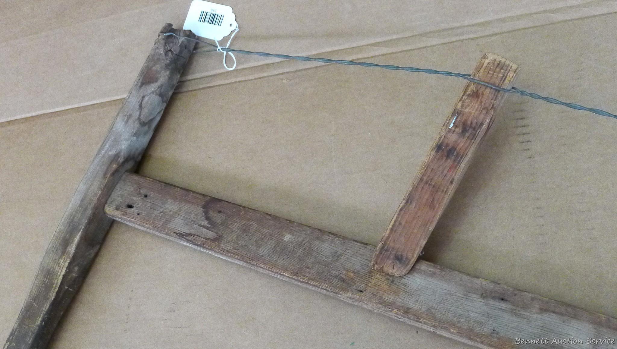 Buck saw, blade measures 27''. Wood is in nice shape.