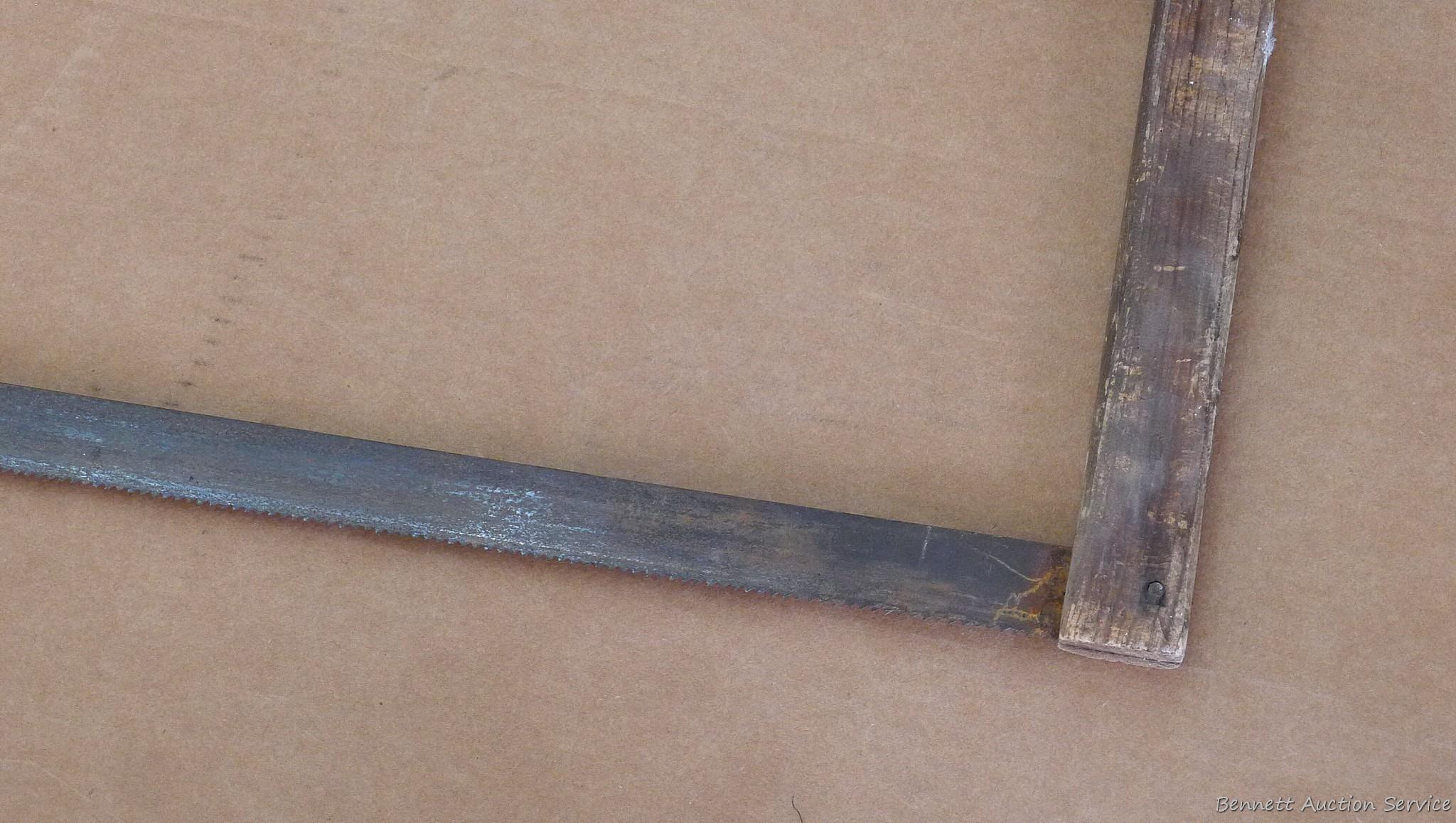 Buck saw, blade measures 27''. Wood is in nice shape.