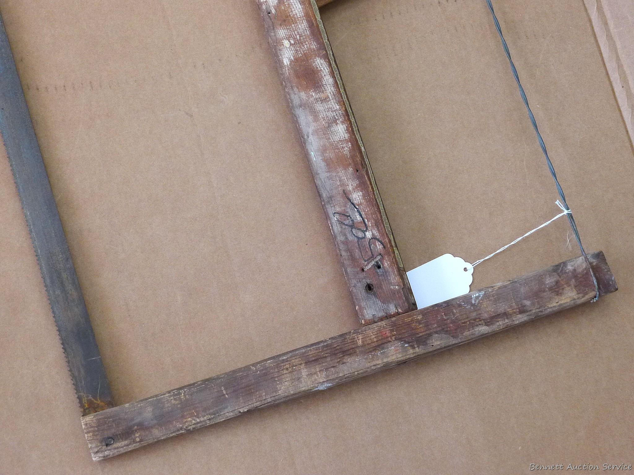 Buck saw, blade measures 27''. Wood is in nice shape.