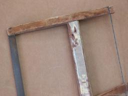 Buck saw, blade measures 27''. Wood is in nice shape.