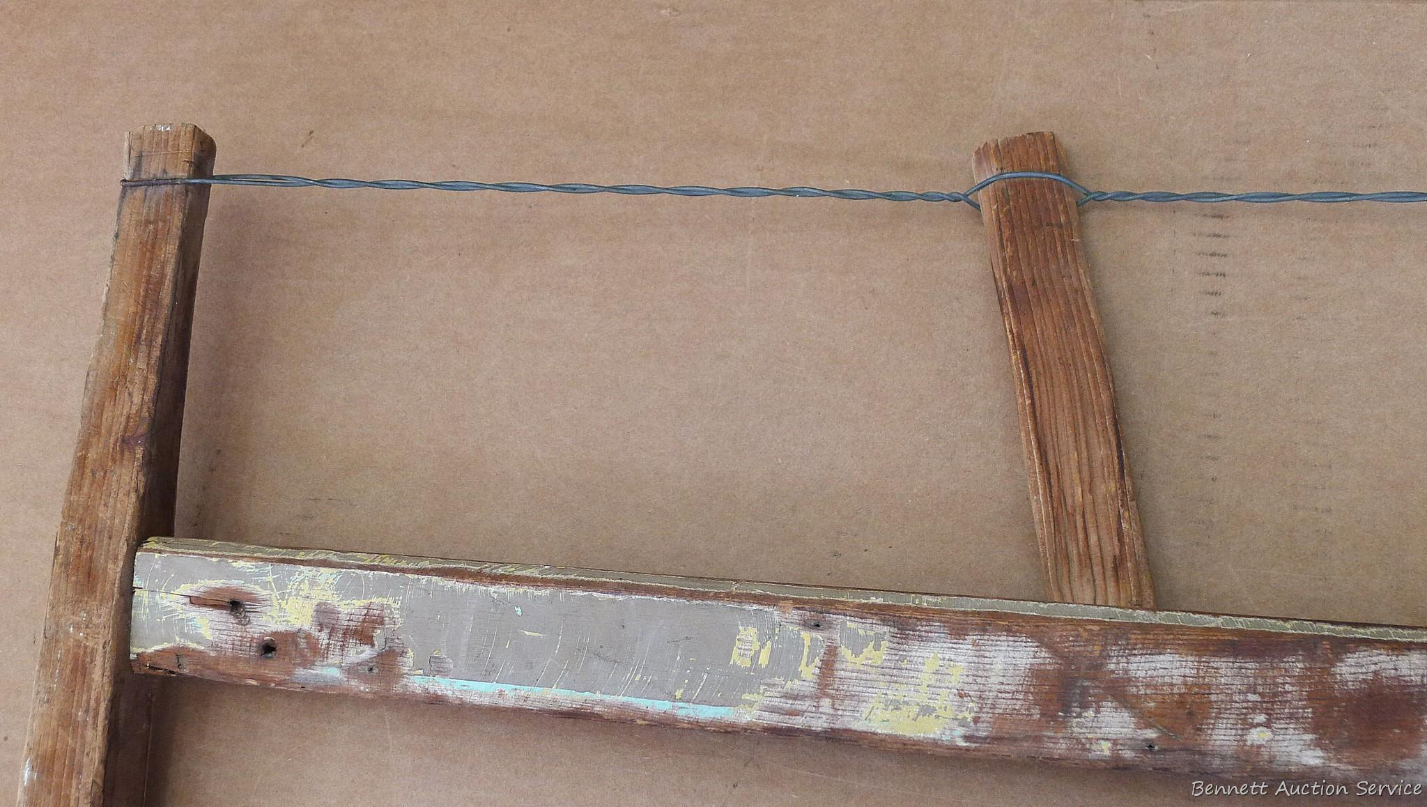 Buck saw, blade measures 27''. Wood is in nice shape.