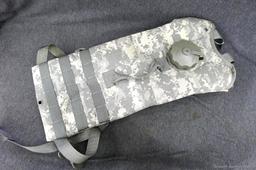 U.S. Military Hydramax water pack is in good condition and measures about 20" x 9".