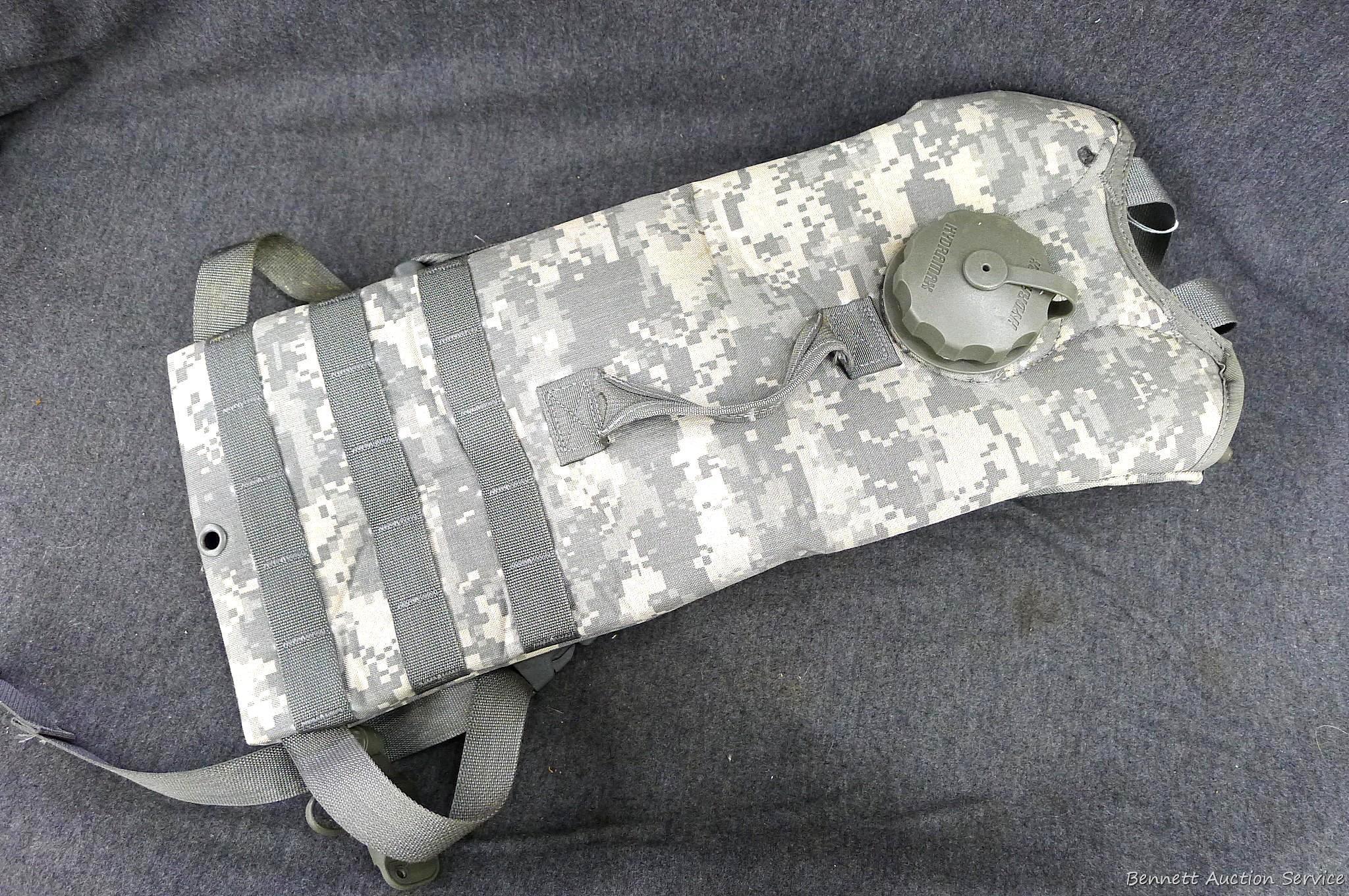 U.S. Military Hydramax water pack is in good condition and measures about 20" x 9".