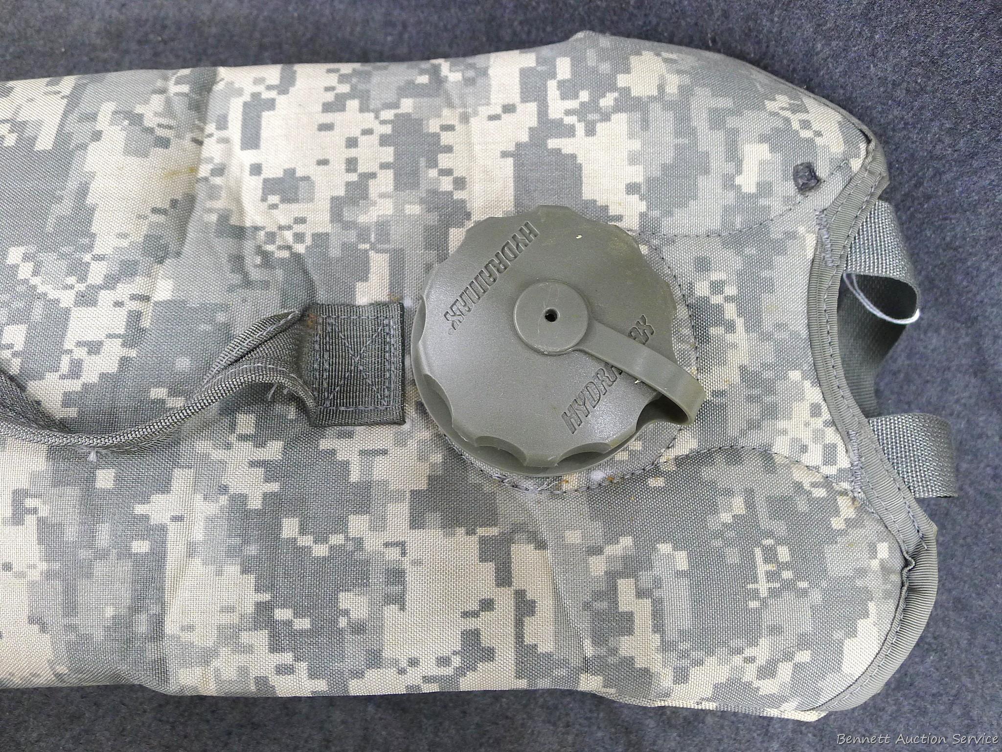 U.S. Military Hydramax water pack is in good condition and measures about 20" x 9".