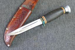 8" Kabar fixed blade knife with leather sheath.