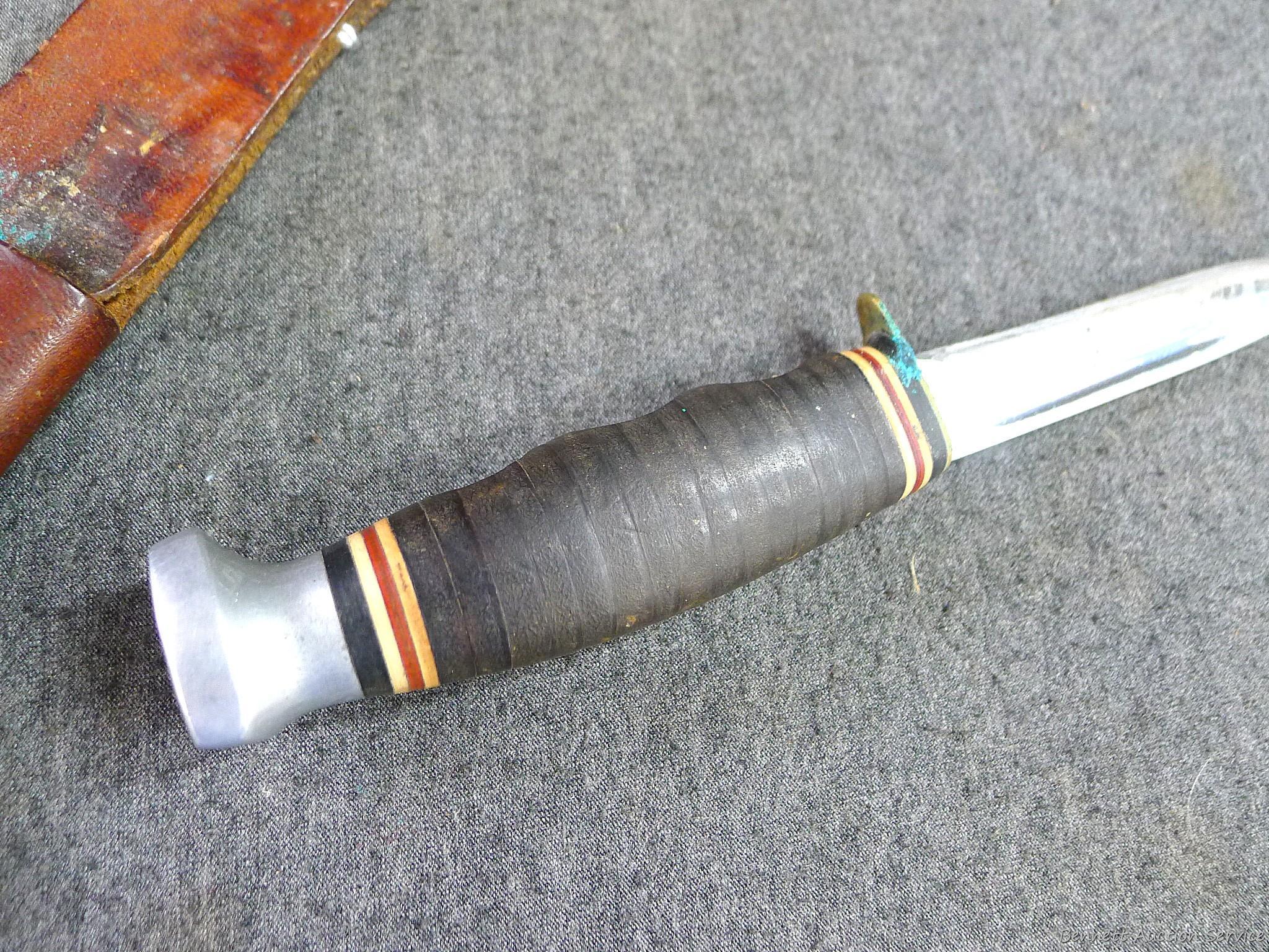 8" Kabar fixed blade knife with leather sheath.
