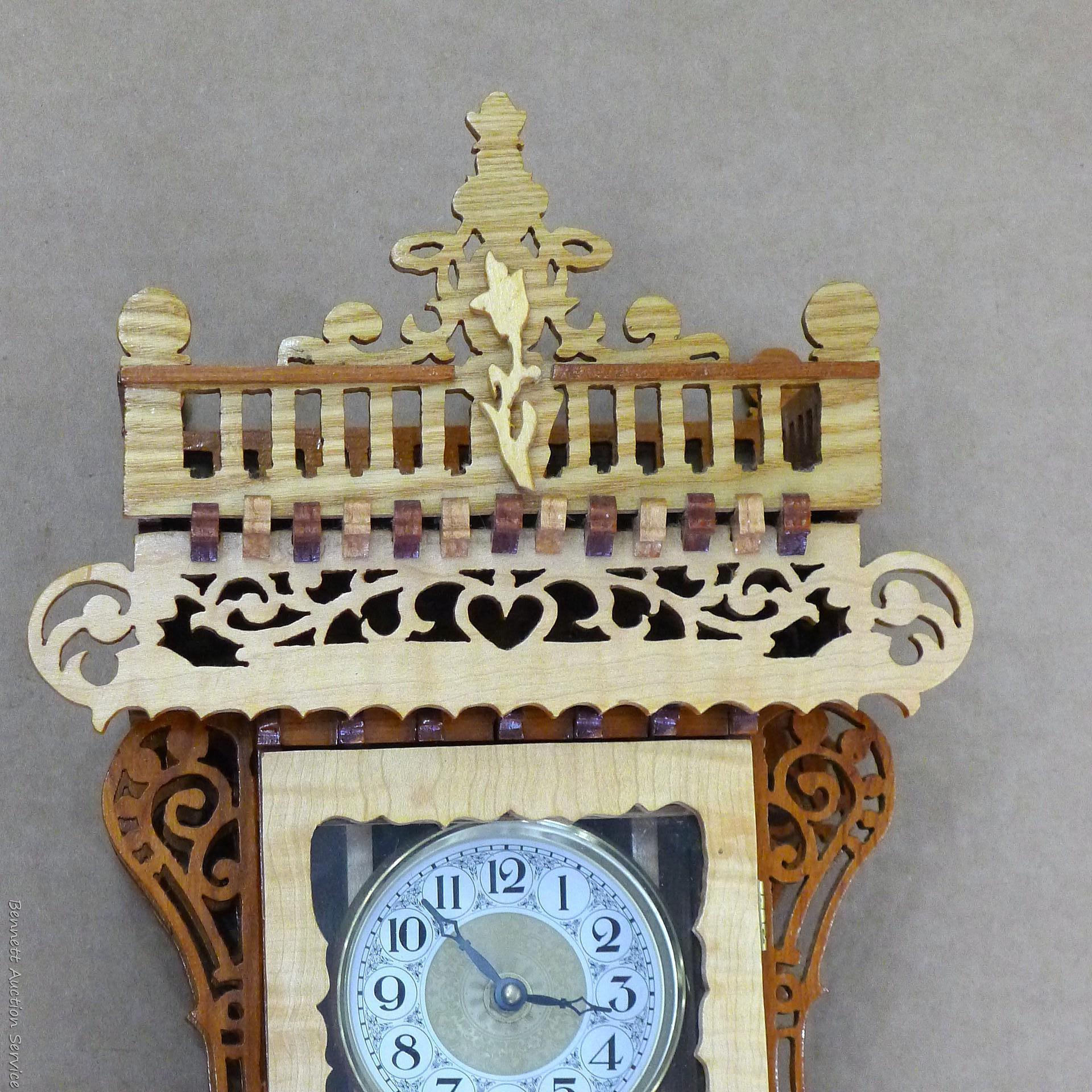 Beautiful ornate wall clock with scroll work; measures 11" x 5" x 30" tall. May need new battery.