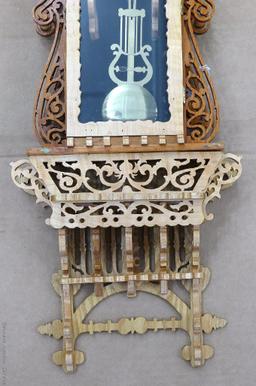 Beautiful ornate wall clock with scroll work; measures 11" x 5" x 30" tall. May need new battery.
