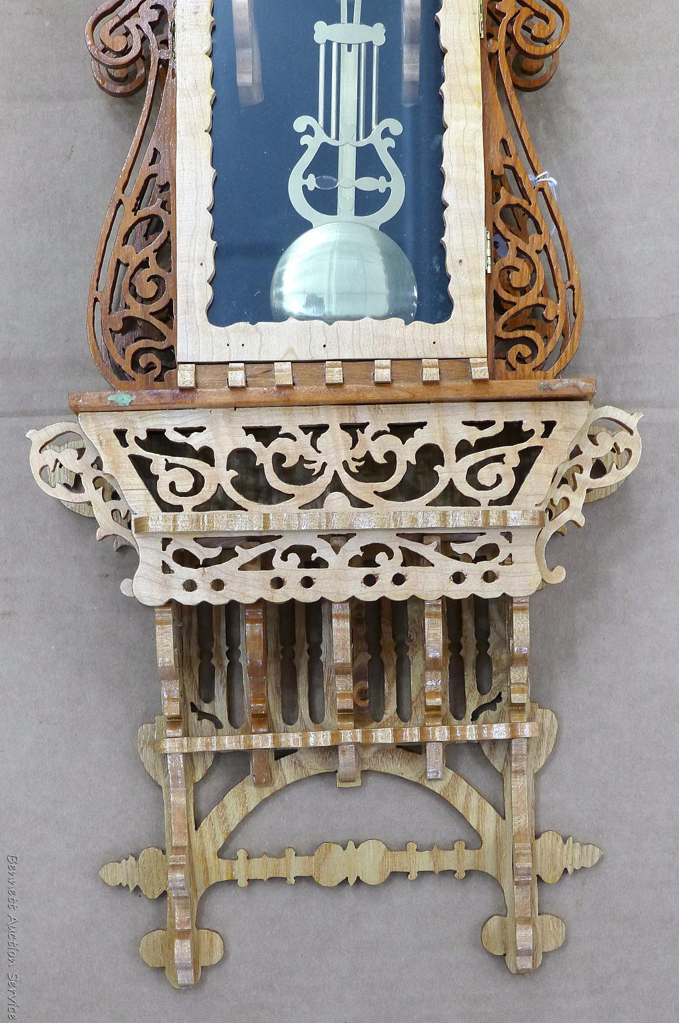 Beautiful ornate wall clock with scroll work; measures 11" x 5" x 30" tall. May need new battery.