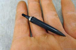 Four .30-06 cartridges four unassembled broadheads, one 12 gauge shot shell.