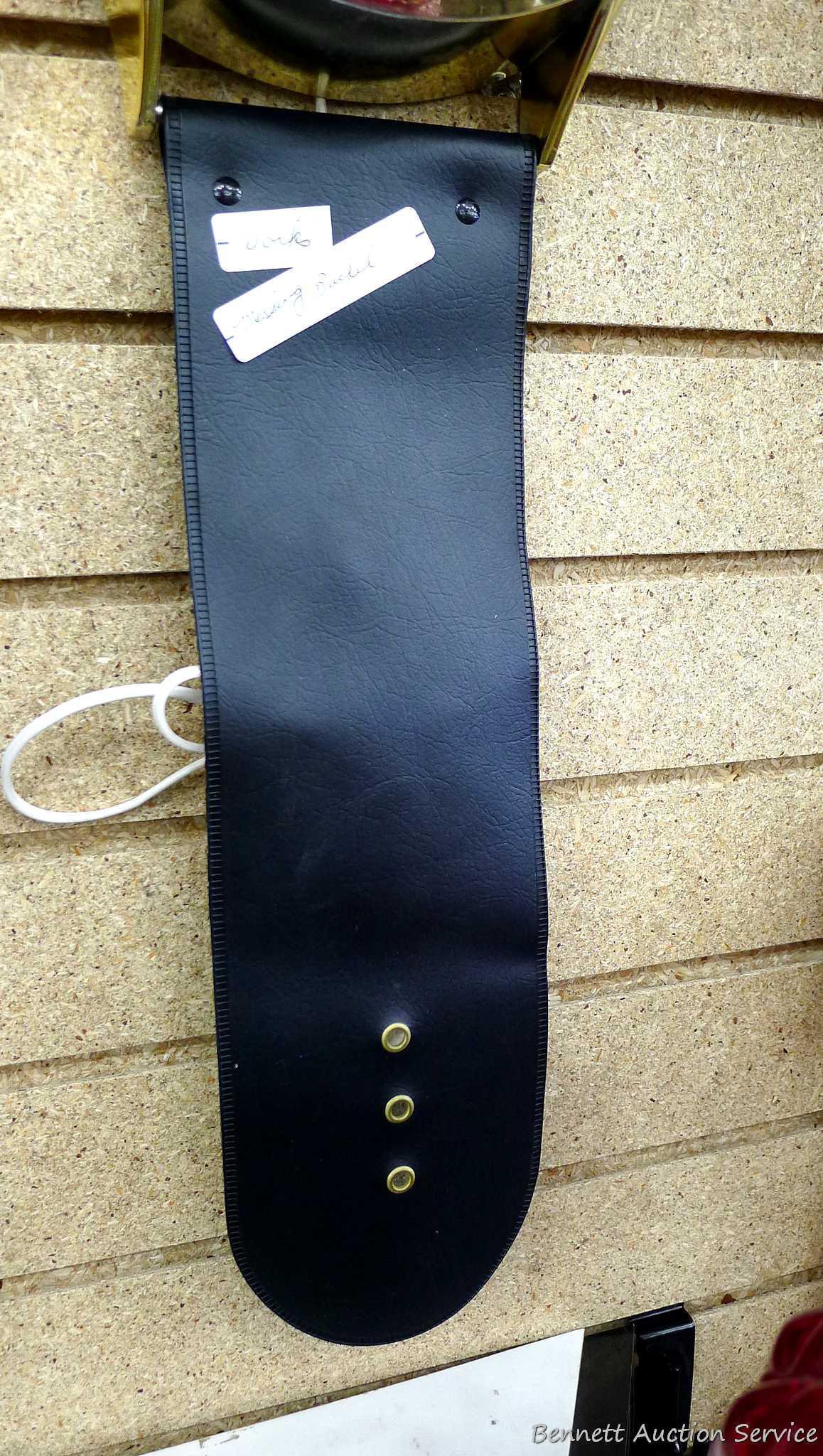 Mickey Mouse watch electric wall clock; measures 9" x 37". Seller states it works, is missing the