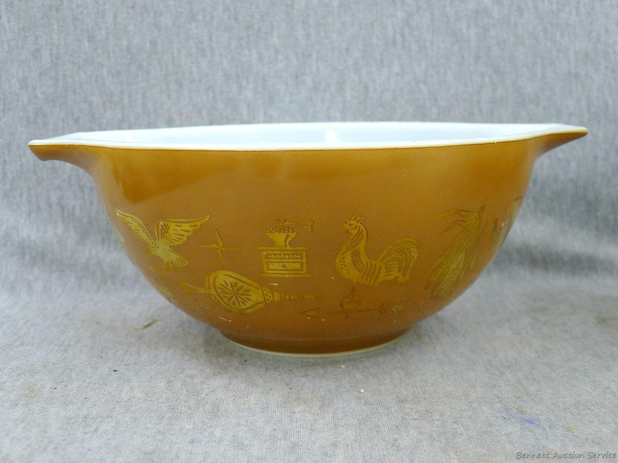 Matching set of 4 Pyrex Early American mixing bowls; largest bowl measures 10" x 13" over handles x