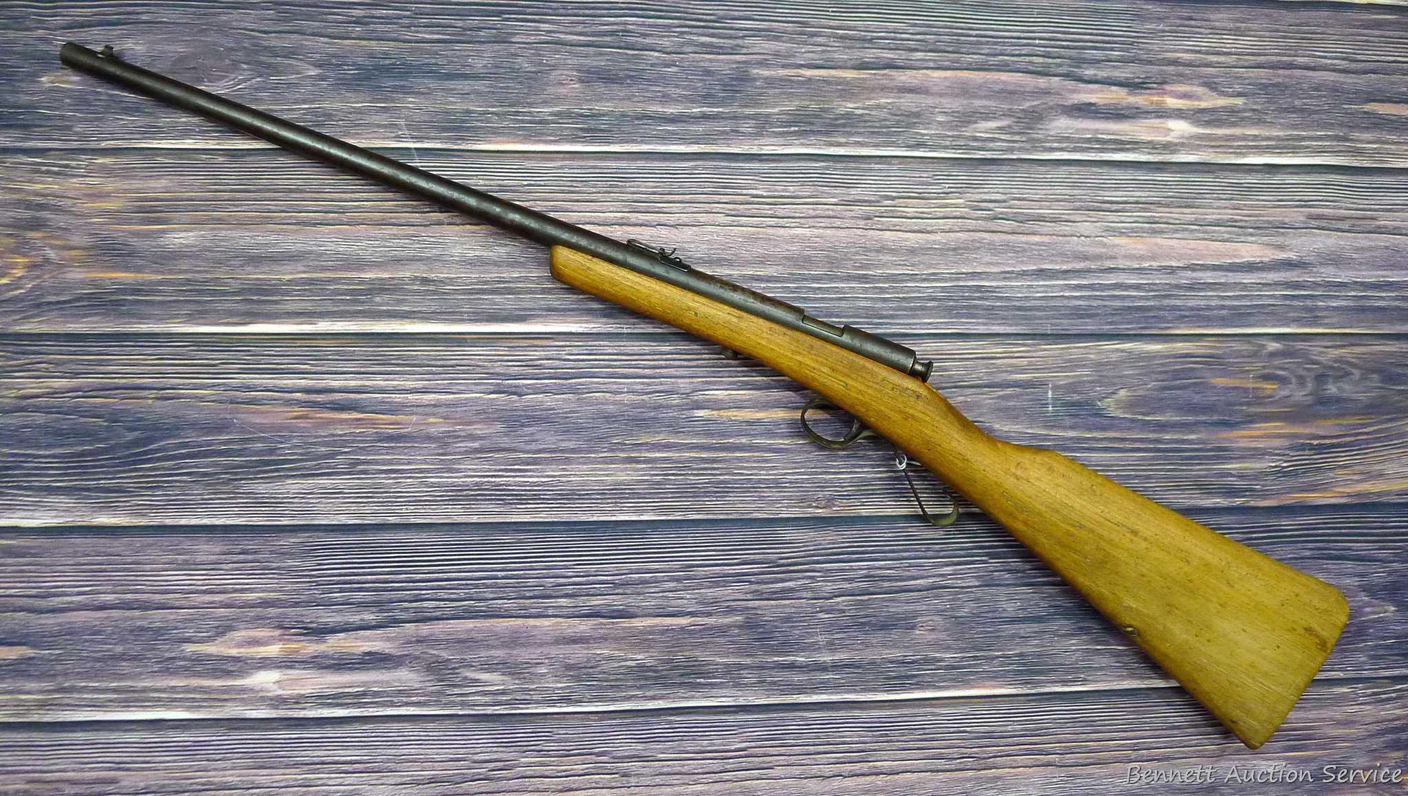 Savage Model 1911 bolt action boys rifle chambered .22 Short. 20" barrel is uniformly dark with weak