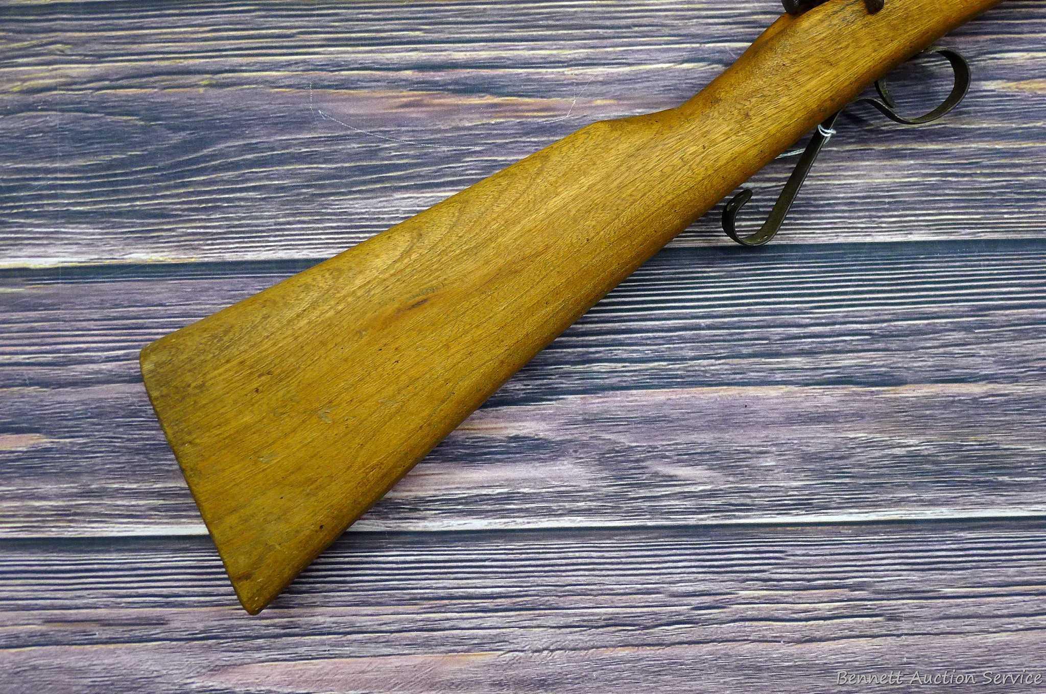 Savage Model 1911 bolt action boys rifle chambered .22 Short. 20" barrel is uniformly dark with weak