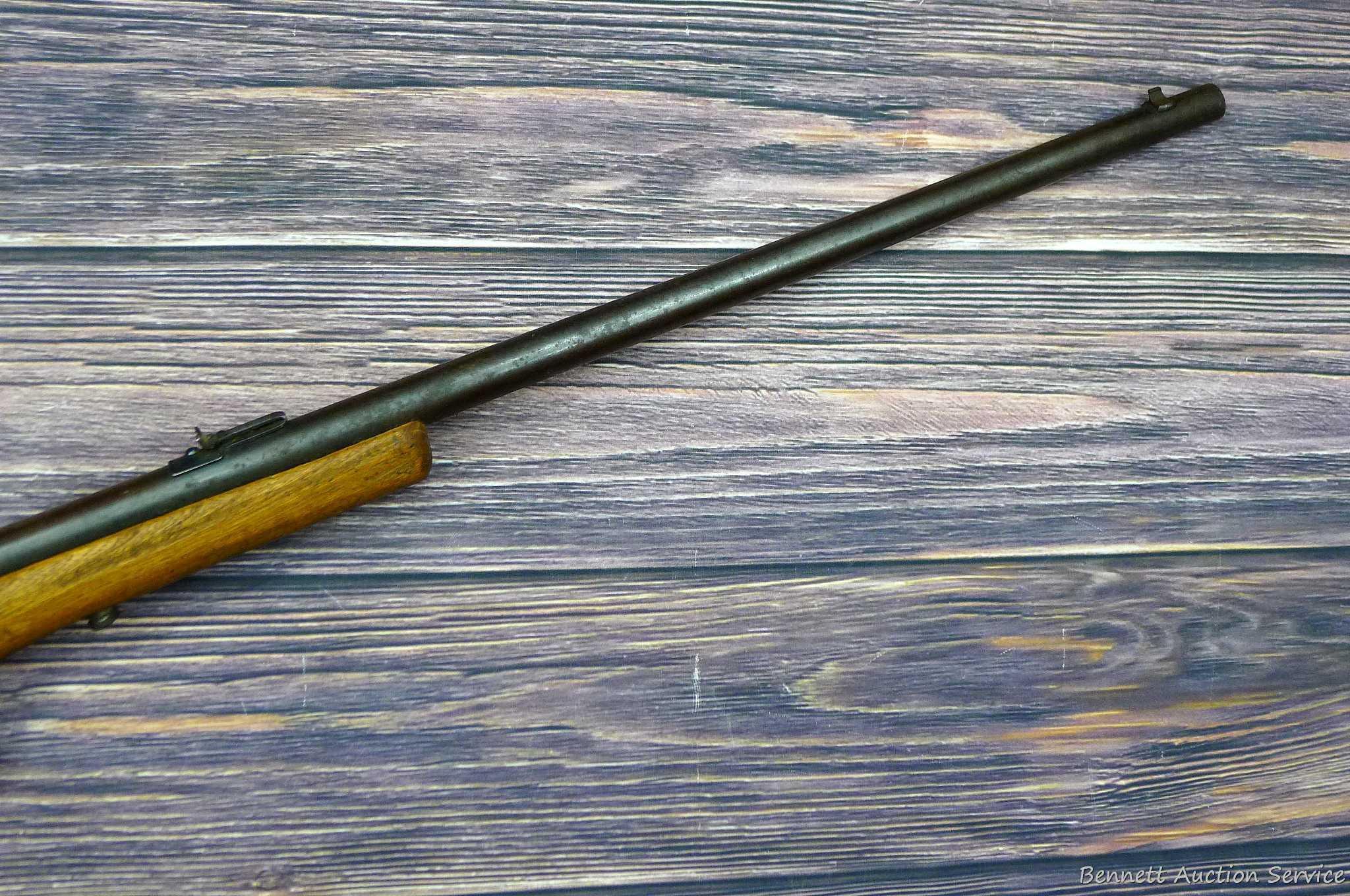 Savage Model 1911 bolt action boys rifle chambered .22 Short. 20" barrel is uniformly dark with weak
