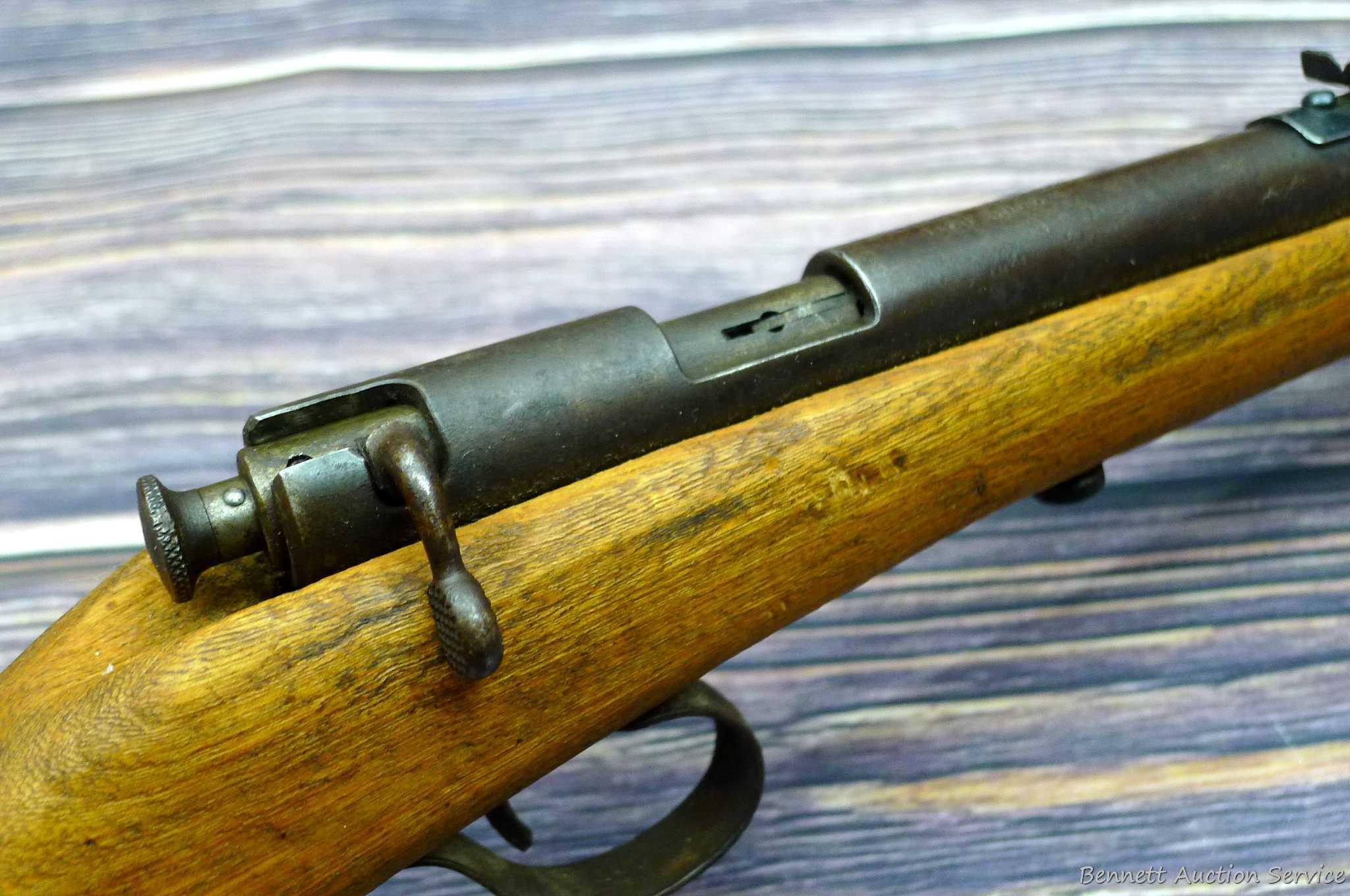 Savage Model 1911 bolt action boys rifle chambered .22 Short. 20" barrel is uniformly dark with weak