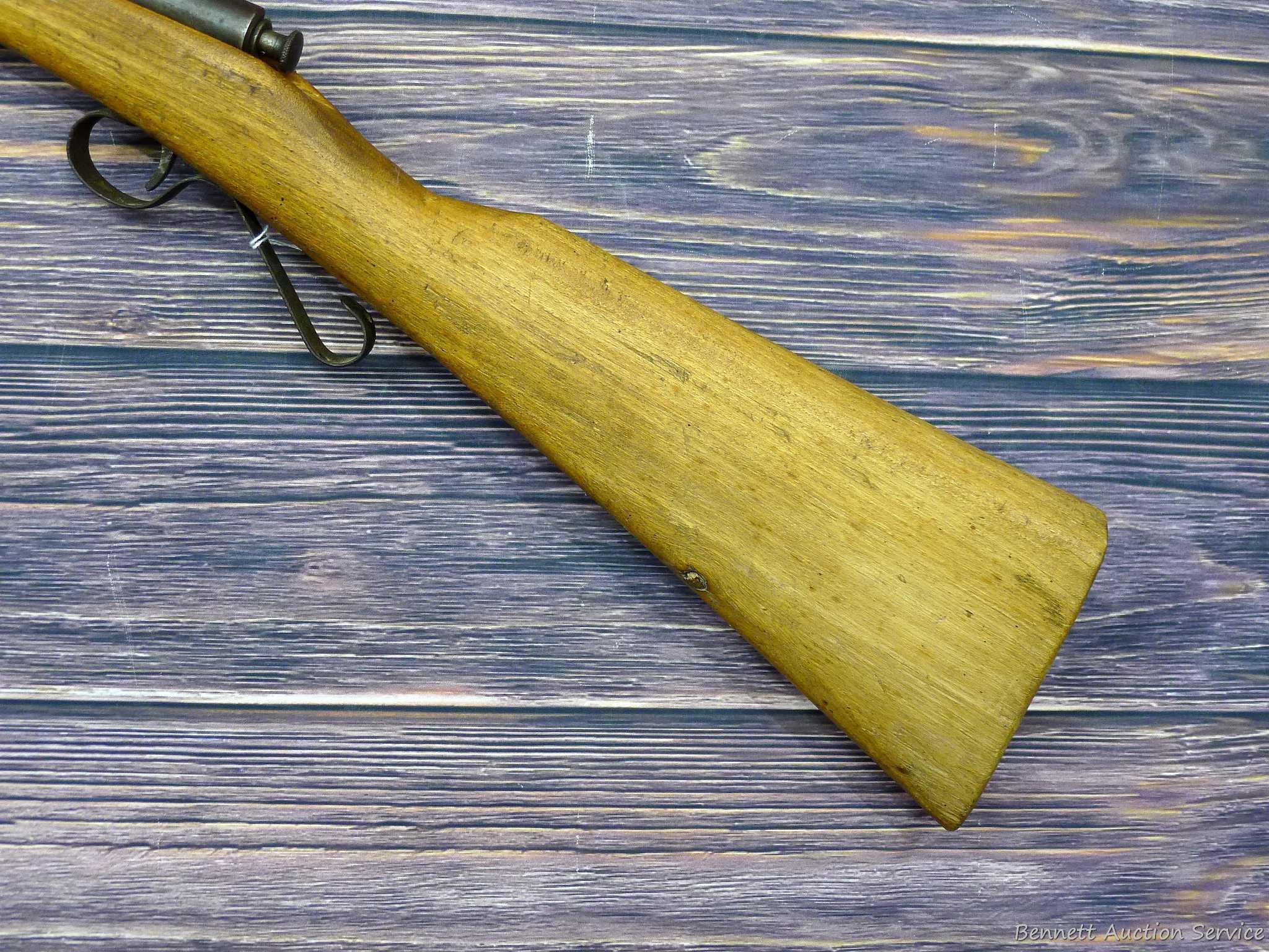 Savage Model 1911 bolt action boys rifle chambered .22 Short. 20" barrel is uniformly dark with weak