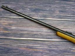 Savage Model 1911 bolt action boys rifle chambered .22 Short. 20" barrel is uniformly dark with weak