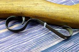 Savage Model 1911 bolt action boys rifle chambered .22 Short. 20" barrel is uniformly dark with weak