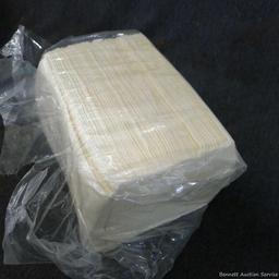 Large collection of disposable paper and cloth shop or cleaning rags.