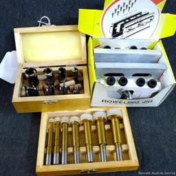 4-3/4" doweling jig with 11 bushings, plug cutters, and a Forstner bit set up to 1". Forstner bits