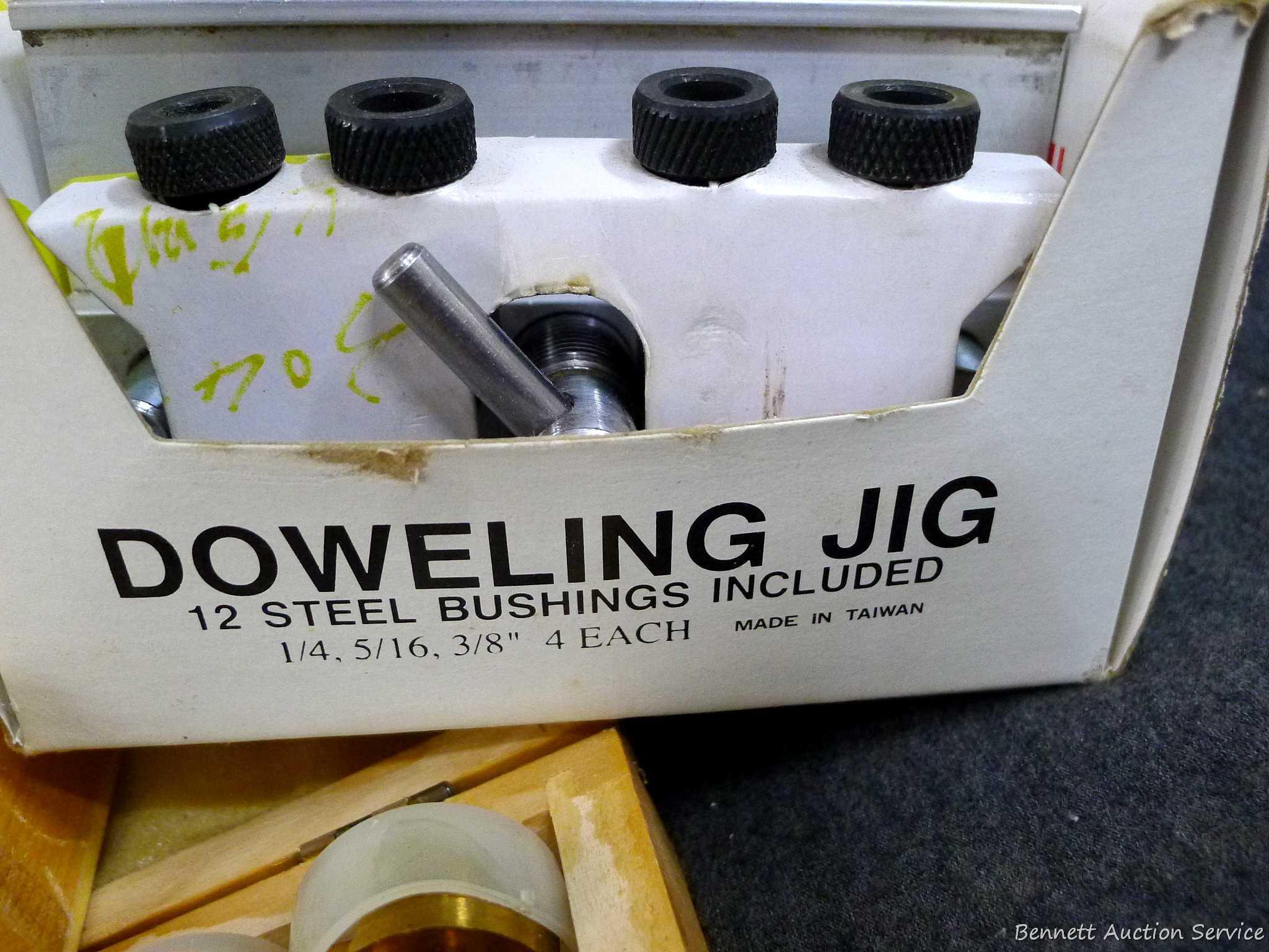4-3/4" doweling jig with 11 bushings, plug cutters, and a Forstner bit set up to 1". Forstner bits